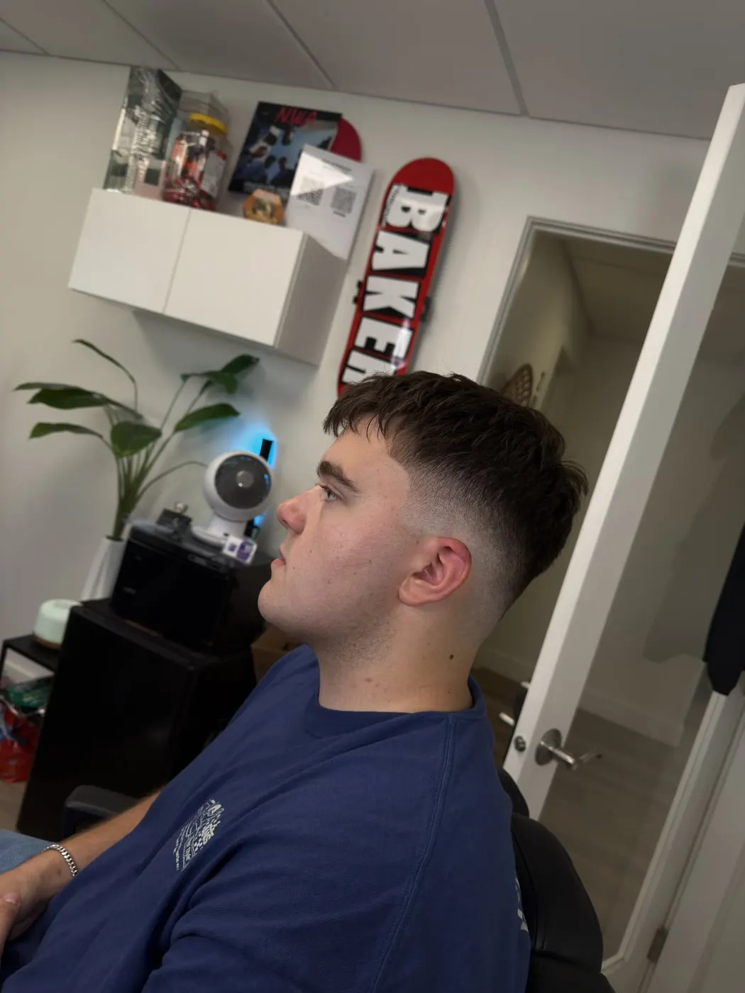 Textured crop with a drop fade in the Bulletproof Barbering studio in Bountiful, Utah