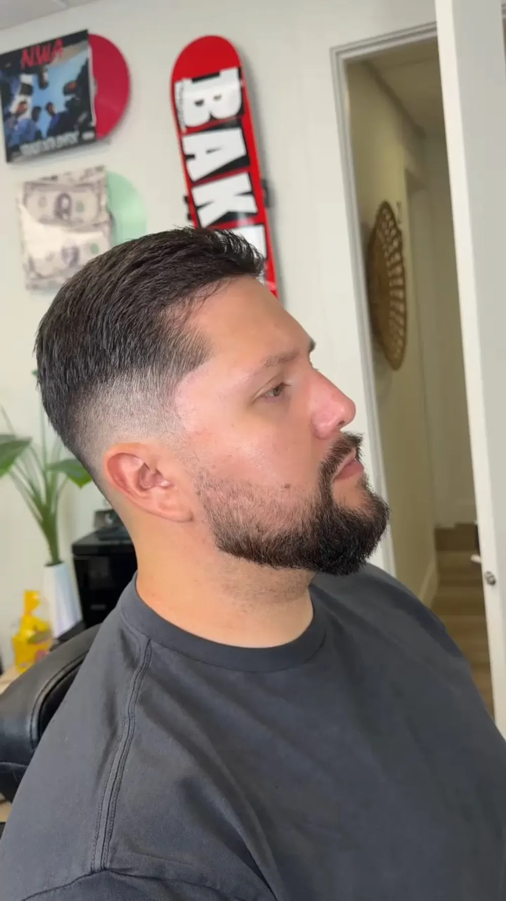 Mid skin fade with a shaped full beard, side profile, at Bulletproof Barbering in Bountiful, Utah